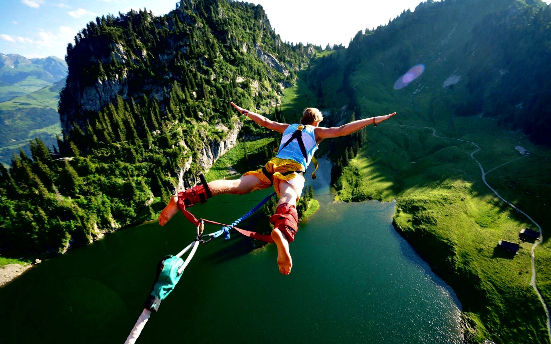 bungee-jumping-over-a-mountain-lake_1920x1200_792-wide